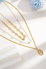 Charger l'image dans la galerie, COSMOS - Collier triple rang doré acier inoxydable perles maillons
