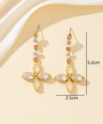 Charger l'image dans la galerie, Blossom bijoux - Boucles d’oreilles croix strass &amp; fleurs – 26PEBOL025
