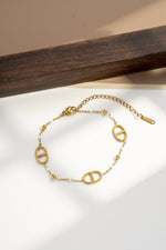 Charger l'image dans la galerie, COSMOS - Bracelet ovales acier inoxydable doré délicat moderne chic
