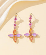 Charger l'image dans la galerie, Blossom bijoux - Boucles d’oreilles croix strass &amp; fleurs – 26PEBOL025
